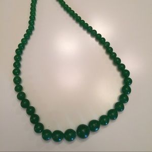 Green gemstone (likely Chalcedony) beads. 30”